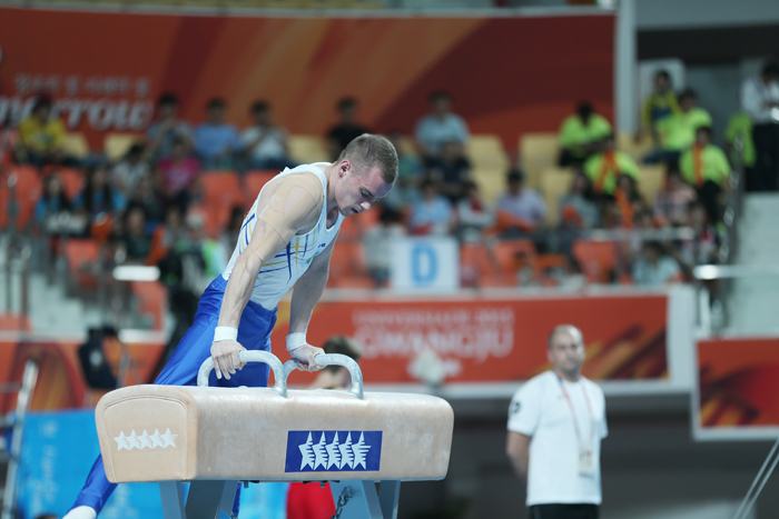  Oleg Verniaiev performs on the vault during the men's gymnastics competition in Gwangju. 