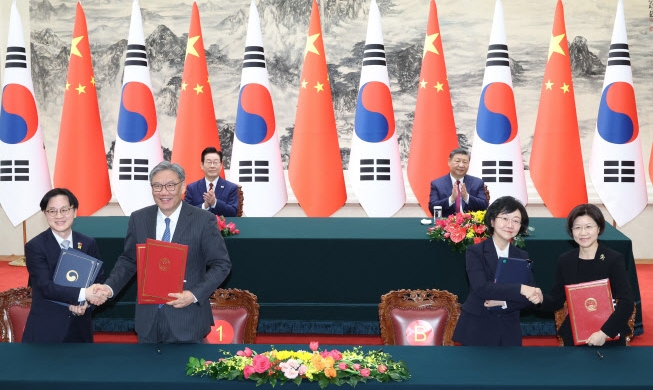 كوريا والصين توقعان 14 مذكرة تفاهم بشأن التعاون في مجالات التكنولوجيا والبيئة وغيرها