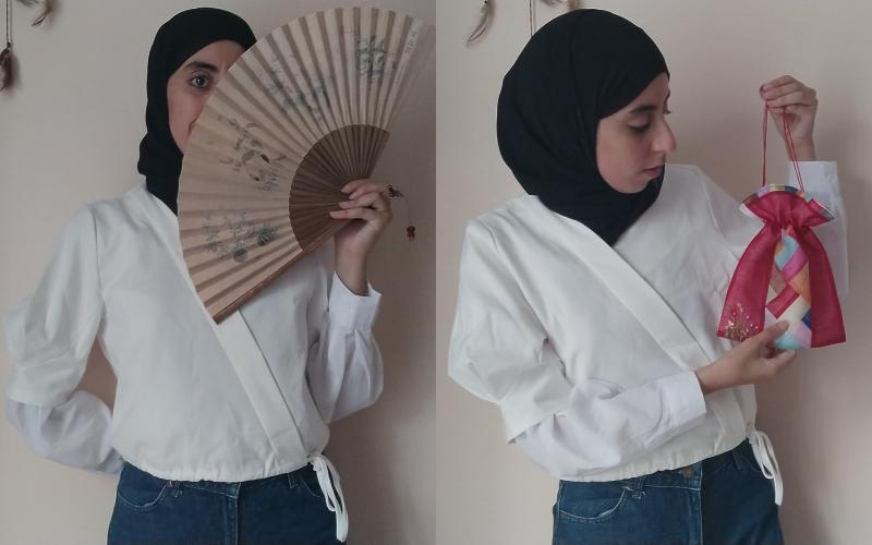 تظهر الصورة المراسلة الفخرية عنان شيماء مرتدية الجوغوري. (الصورة من المراسلة الفخرية عنان شيماء)