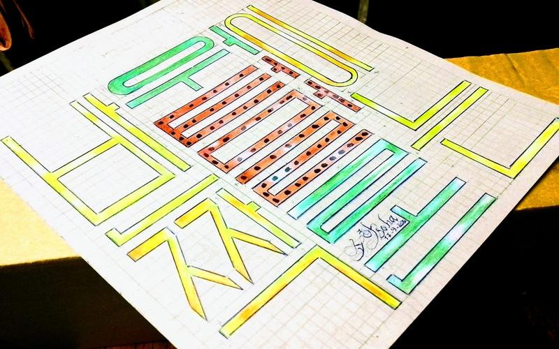 صورة توضح تصميمًا بالخط 'الكوفي المربّع' لعنوان أحد المسلسلات: 'البطيخ المتلألئ' (الصورة من المراسلة، سُها علي.)