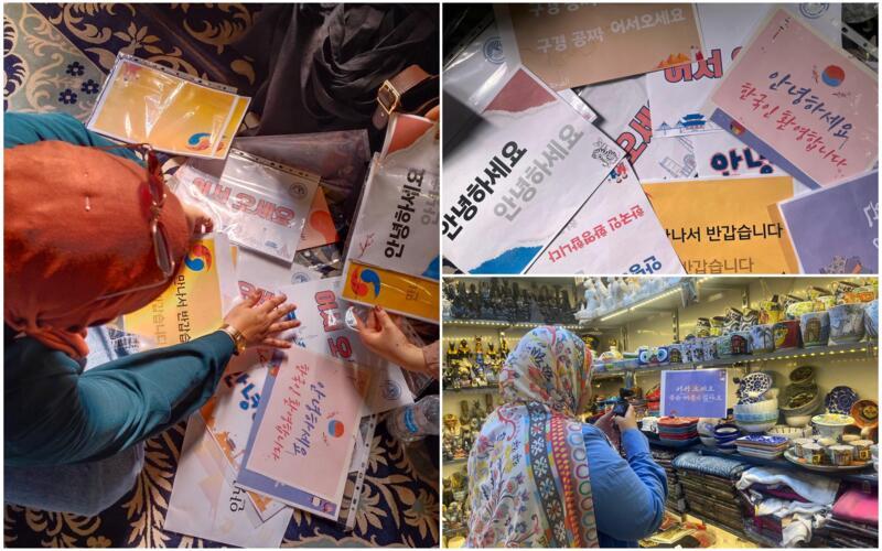 نرى في الصور قيام الفريق بإعداد وتصميم لافتات وعبارات ترحيبية باللغة الكورية وتوزيعها على المتاجر في خان الخليلي، بهدف مساعدة التجار على التواصل مع الزوار الكوريين وتعزيز شعورهم بالترحيب أثناء زيارتهم للسوق. (الصور من أعضاء الفريق وتم أخذ الإذن لاستخدامها)
